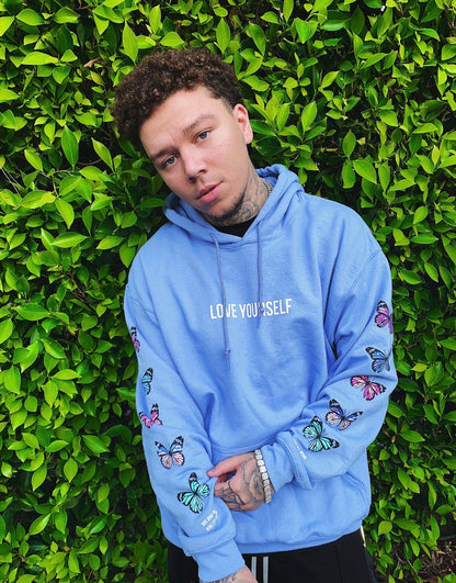 LOVE YOURSELF BROKEN BUTTERFLY HOODIE - LIGHT BLUE